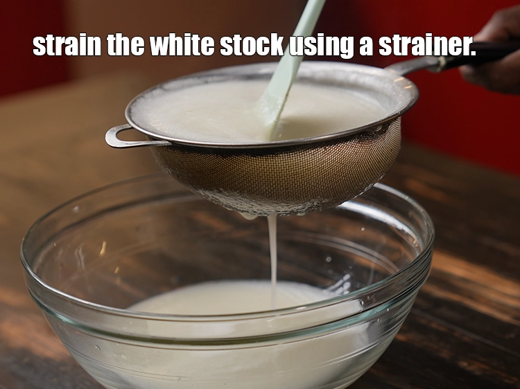Step 28 – <p>Strain the white stock using a strainer.&nbsp;</p>