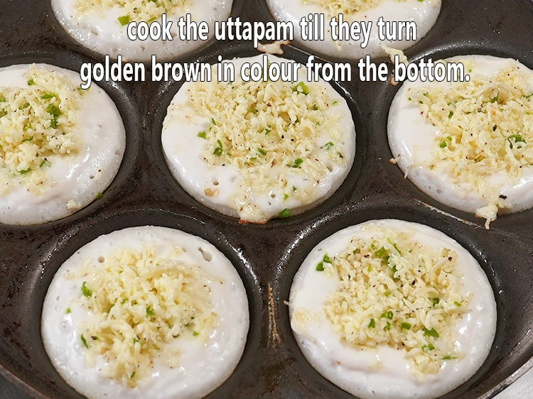 Step 9 – <p>Cook the uttapam till they turn golden brown in colour from the bottom.</p>