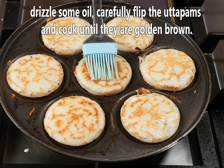 Step 10 – <p>Drizzle some oil, carefully flip the uttapams and cook until they are golden brown.</p>