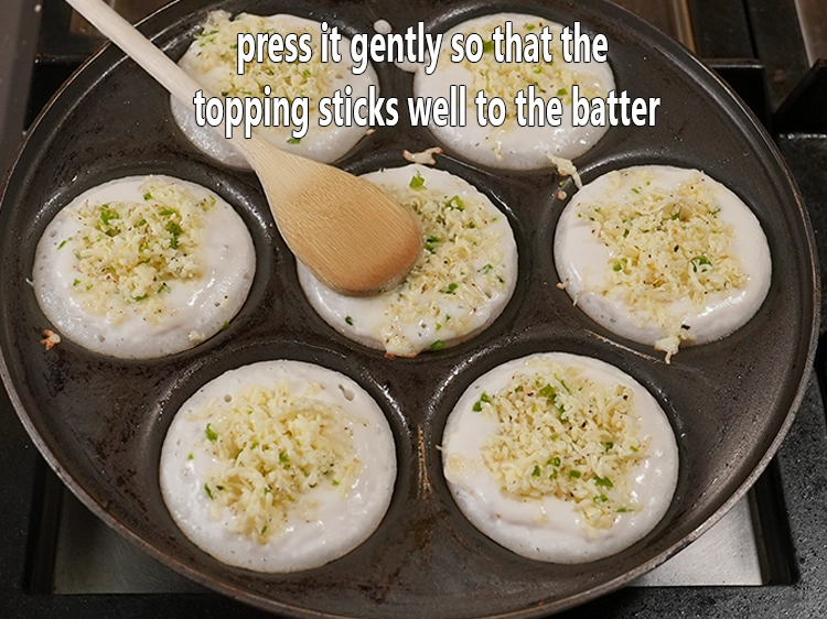 Step 8 – <p>Press it gently so that the topping sticks well to the batter.</p>