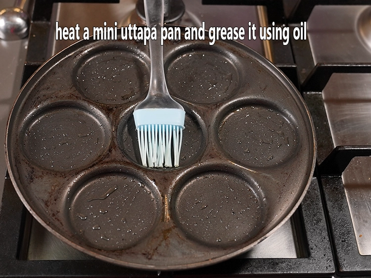 Step 4 – <p>To prepare mini cheese uttapam at home, heat a mini uttapa pan and grease it …