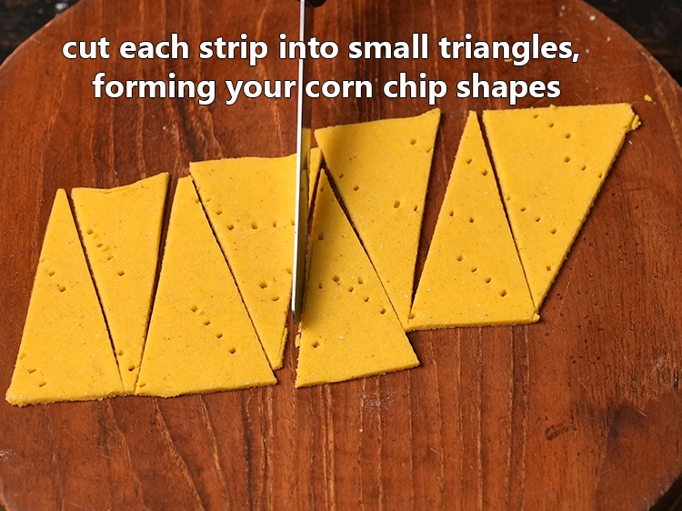 Step 12 – <p><strong>Cut each strip into small triangles</strong><span style="background-color:rgb(255,255,255);color:rgb(0,0,0);">, forming your corn chip shapes.</span></p>