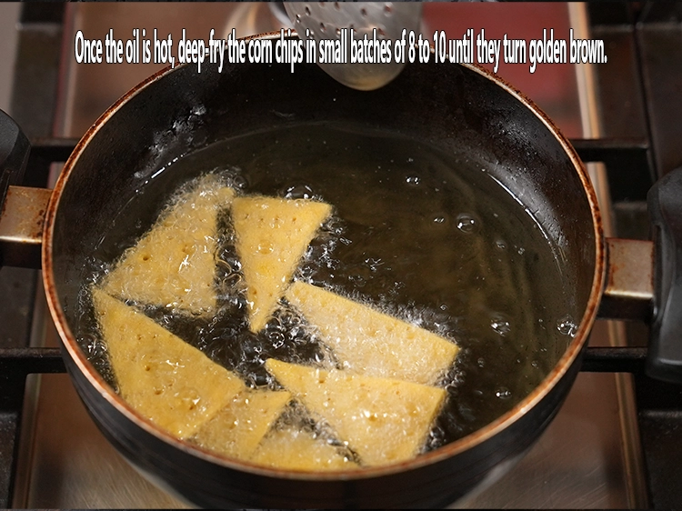 Step 22 – <p style="margin-left:0px;"><span style="background-color:rgb(255,255,255);color:rgb(0,0,0);">Once the oil is hot, </span><strong>deep-fry the corn chips in small batches of …