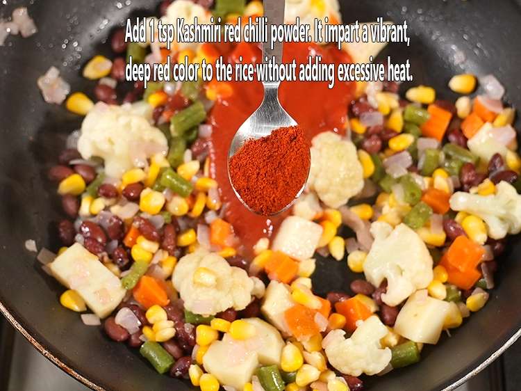 Step 13 – <p>Add 1 tsp <a href="/glossary-chilli-powder-red-chilli-powder-339i#ing_3363"><u>Kashmiri red chilli powder</u></a><u>. It</u><span style="color:rgb(0,0,0);"> impart a </span><strong>vibrant, deep red …
