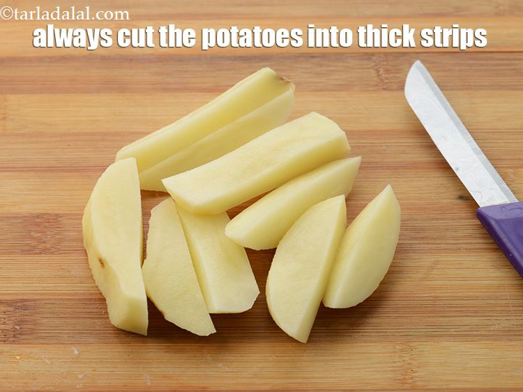 Step 27 – <p>Cut the potatoes into thick strips or wedges so they do not break while cooking.&nbsp;</p>