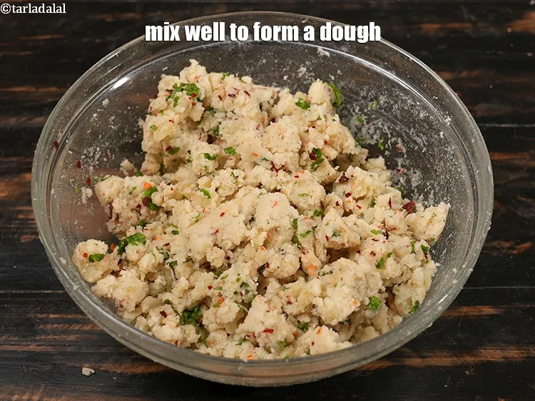 Step 38 – <p>Mix well to form a dough.</p>