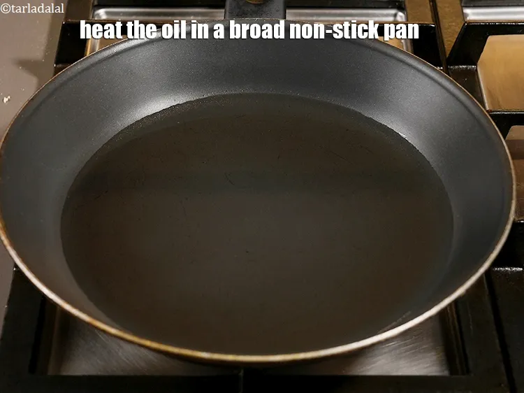 Step 40 – <p>Heat the oil in a broad non-stick pan.</p>