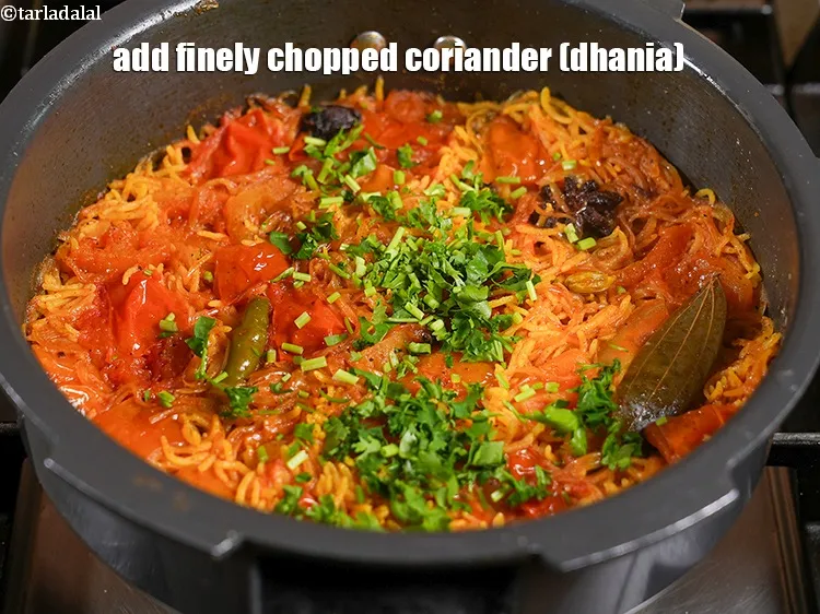 Step 29 – <p><span style="background-color:rgb(255,255,255);color:rgb(0,0,0);">Add 2 tbsp finely </span><a href="https://www.tarladalal.com/glossary-coriander-dhania-kothmir-369i#ing_2365"><u>chopped coriander (dhania)</u></a></p>