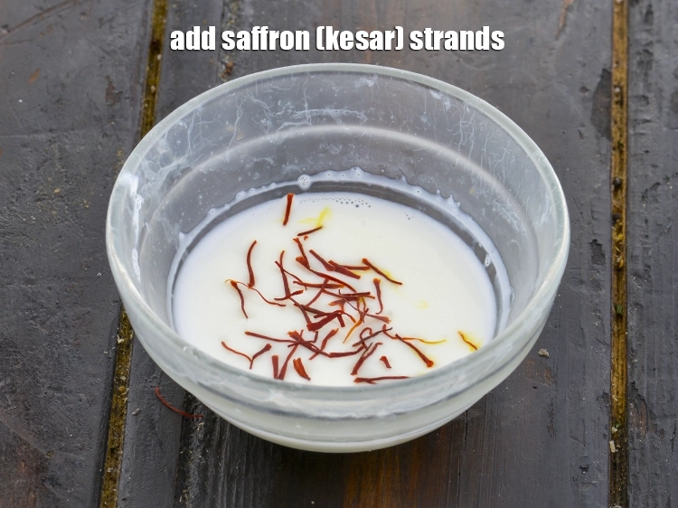 Step 12 – <p>Add the saffron strands to it.</p>