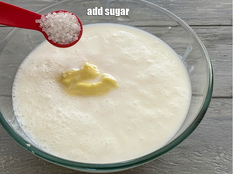 Step 6 – <p>Add sugar. Adjust the quantity depending on the sweetness of shrikhand and tang from the …
