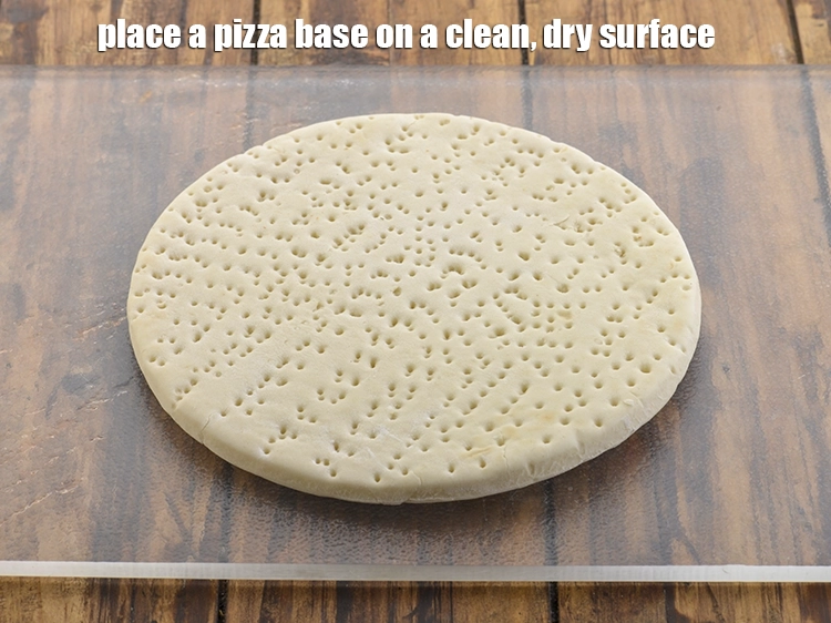 Step 23 – <p>Place a pizza base on a clean, dry surface. Pizza bases are available readily in …