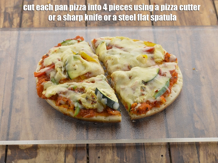 Step 35 – <p>Cut each <strong>pan pizza</strong> into 4 pieces using a pizza cutter or a sharp knife …