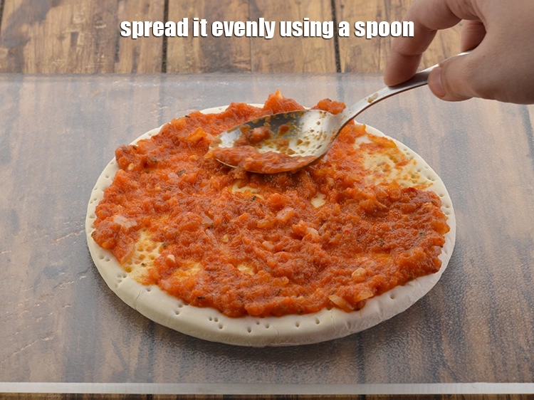 Step 25 – <p>Spread it evenly using a spoon.</p>