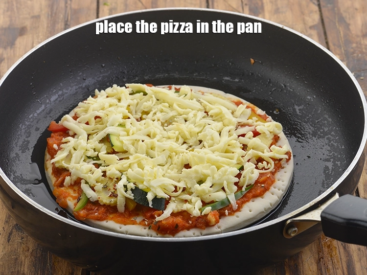 Step 31 – <p>Place the pizza in the pan. This is an easier and more Indian way to …