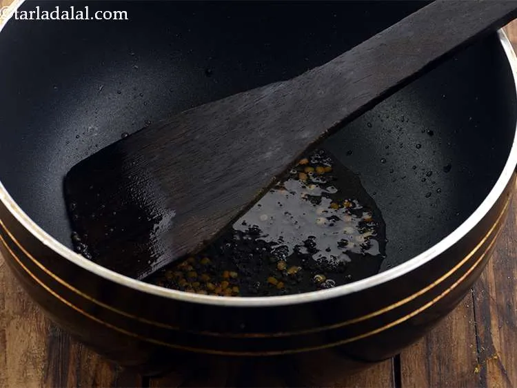 Step 21 – <p><span style="color:rgb(0,0,0);">Sauté on a medium flame for 30 seconds or till the dal turns light …