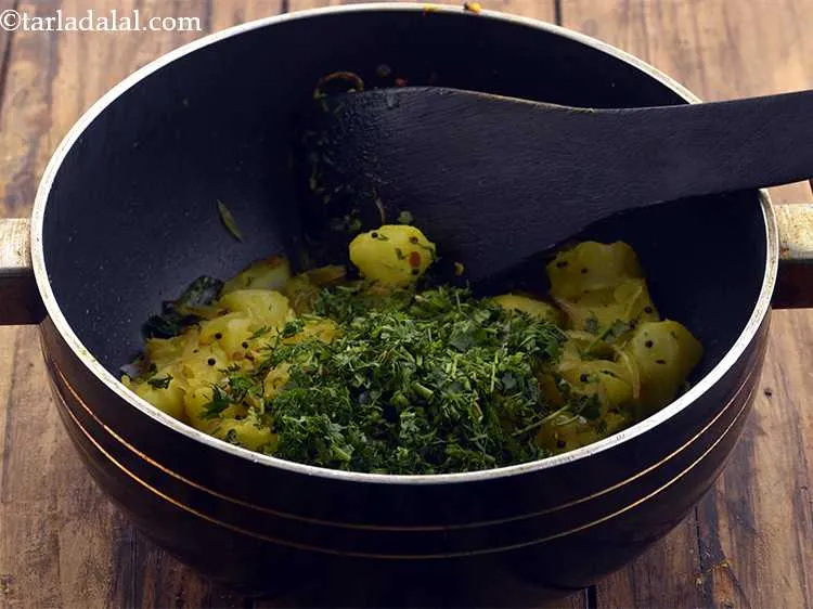 Step 31 – <p><span style="color:rgb(0,0,0);">Add the coriander.</span></p>