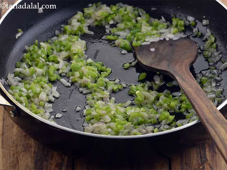 Step 36 – <p>Add the capsicum and sauté on a medium flame for 1 more minute. They provide …