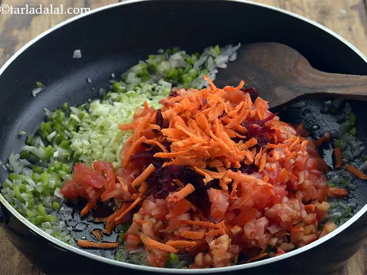 Step 40 – <p>Add the carrots. It is important to grate both beetroot and carrots so, they cook …