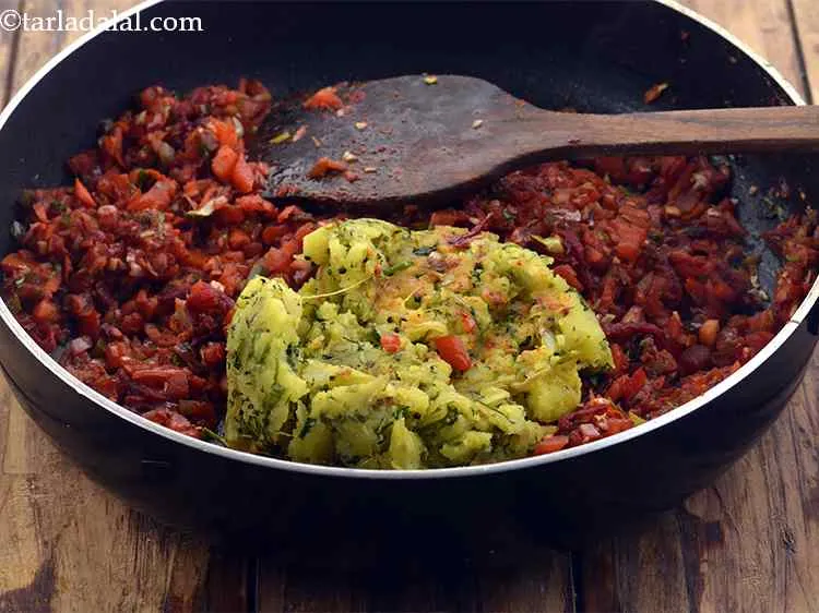 Step 45 – <p>Add the prepared <i>aloo masala</i>. If you are in hurry or want to try a …