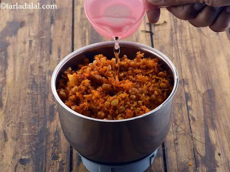 Step 17 – <p><span style="color:rgb(13,13,13);">Allow it to cool slightly and then blend in a mixer. </span>Adding water as …