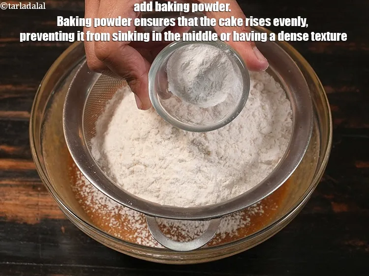 Step 13 – <p>Add 1 tsp&nbsp;<a href="https://www.tarladalal.com/glossary-baking-powder-425i">baking powder</a>. Baking powder ensures that the cake rises evenly, preventing it …