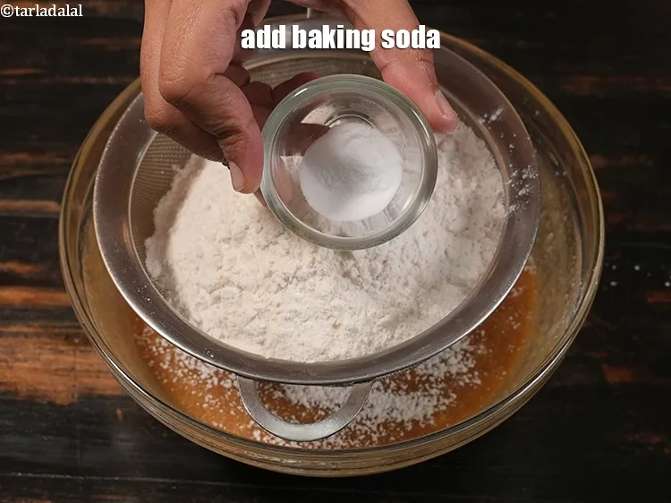Step 14 – <p>Add ½ tsp <a href="https://www.tarladalal.com/glossary-baking-soda-soda-bi-carb-615i">baking soda</a>.&nbsp;</p>