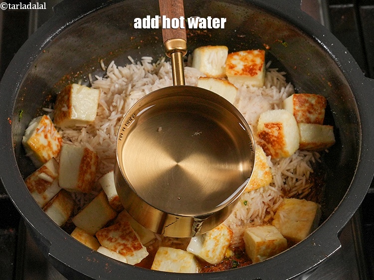 Step 49 – <p>Add 2 cups of hot water.</p>