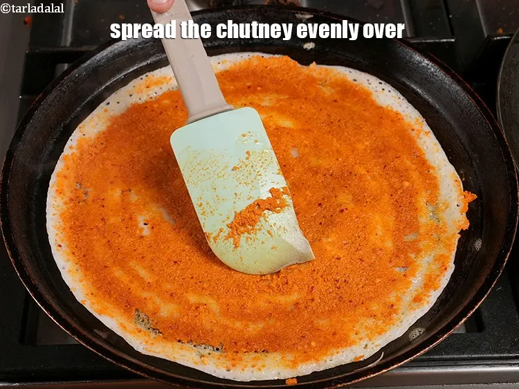 Step 56 – <p>Spread the chutney evenly over it.</p>