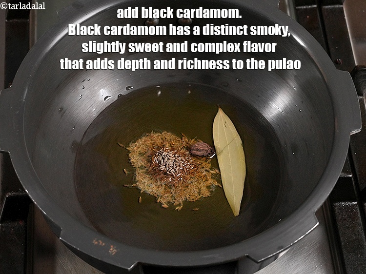 Step 26 – <p>Add 1 <a href="https://www.tarladalal.com/glossary-black-cardamom-badi-elaichi-moti-elaichi-263i">black cardamom (badi elaichi)</a>. Black cardamom has a distinct smoky, slightly sweet …
