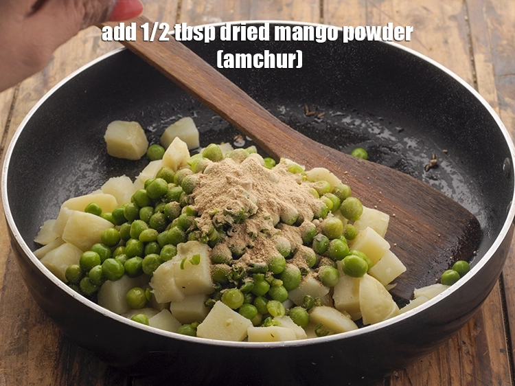 Step 18 – <p>Add <span style="background-color:rgb(255,255,255);color:rgb(0,0,0);">1/2 tbsp </span><a href="https://www.tarladalal.com/glossary-dried-mango-powder-amchur-powder-148i"><u>dried mango powder (amchur)</u></a> to give our stuffing a nice …