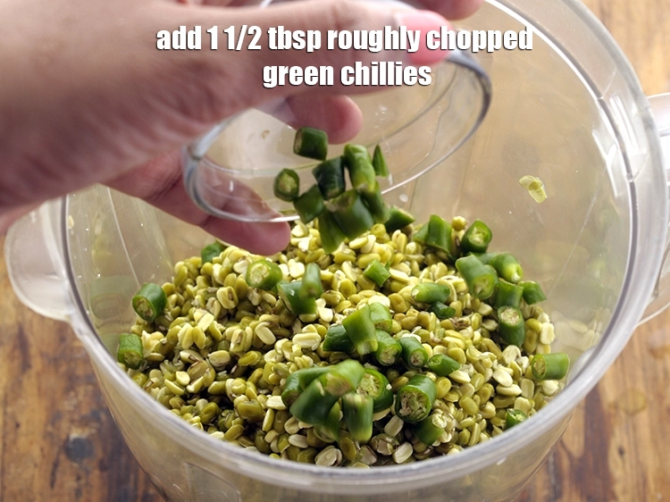 Step 7 – <p>Add <span style="background-color:rgb(255,255,255);color:rgb(0,0,0);">1 1/2 tbsp roughly </span><a href="https://www.tarladalal.com/glossary-green-chillies-hari-mirch-331i#ing_2388"><u>chopped green chillies</u></a>. To make moong dal cheela …