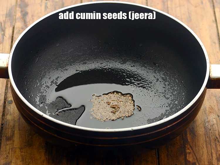 Step 24 – <p><span style="background-color:rgb(255,255,255);color:rgb(0,0,0);">Once the oil is hot, add the 1/2 tsp </span><a href="https://www.tarladalal.com/glossary-cumin-seeds-jeera-zeera-381i"><u>cumin seeds (jeera)</u></a><u>.</u></p>