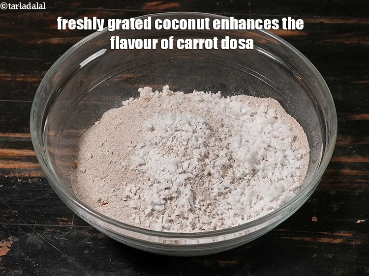 Step 18 – <p>Freshly grated coconut enhances the flavour of carrot dosa.</p>