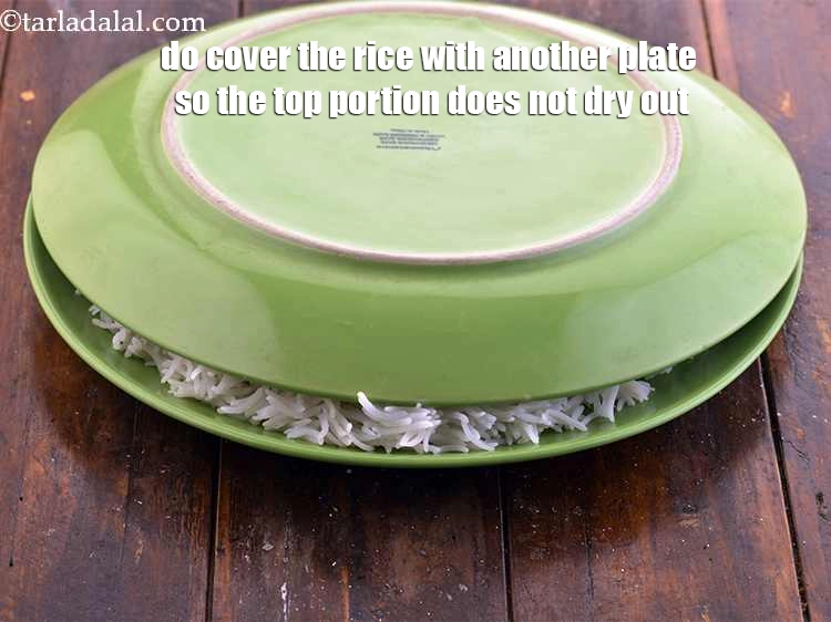 Step 14 – <p>Do cover the rice with another plate so the top portion does not dry out.</p>