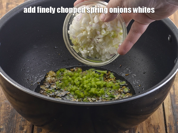 Step 18 – <p>Add the <span style="background-color:rgb(255,255,255);color:rgb(0,0,0);">1/2 cup finely </span><a href="https://www.tarladalal.com/glossary-spring-onion-hara-pyaz-443i#ing_2384"><u>chopped spring onions whites</u></a>. If you do not …