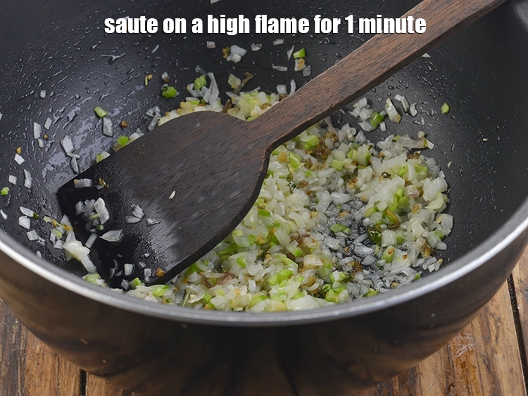 Step 19 – <p>Saute on a high flame for 1 minute.</p>