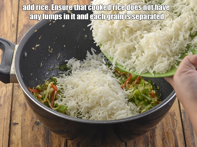 Step 25 – <p><span style="background-color:rgb(255,255,255);color:rgb(0,0,0);">Now add the </span><a href="https://www.tarladalal.com/glossary-long-grain-rice-basmati-chawal-basmati-rice-535i"><u>long grain rice (basmati chawal)</u></a><span style="background-color:rgb(255,255,255);color:rgb(0,0,0);">. Ensure that cooked rice …