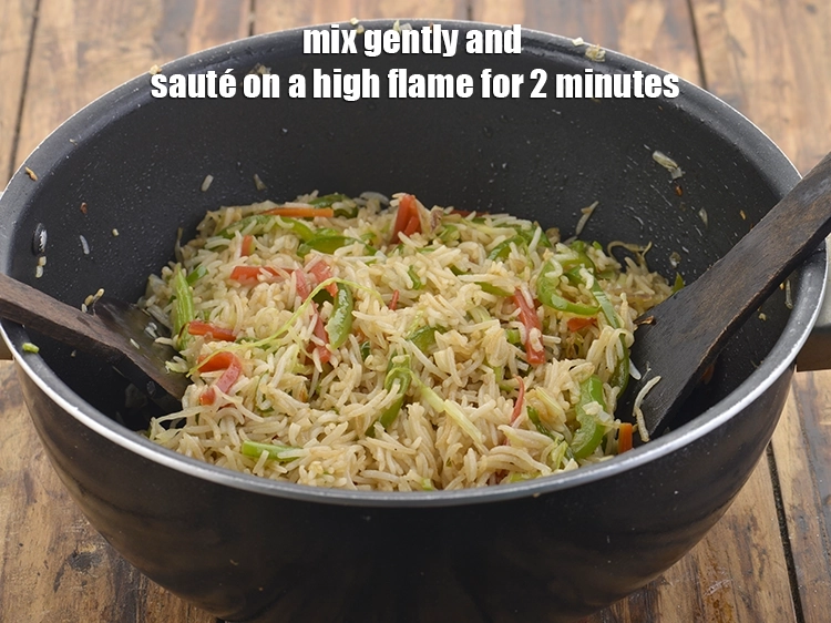 Step 28 – <p><span style="background-color:rgb(255,255,255);color:rgb(0,0,0);">Mix gently and sauté on a high flame for 2 minutes, while stirring occasionally. …
