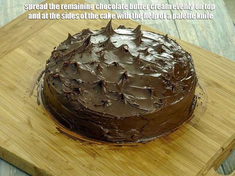 Step 11 – <p><span style="background-color:rgb(255,255,255);color:rgb(0,0,0);">Spread the remaining chocolate butter cream evenly on top and at the sides of …