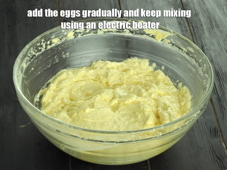 Step 2 – <p><span style="background-color:rgb(255,255,255);color:rgb(0,0,0);">Add the 3 </span><a href="https://www.tarladalal.com/glossary-eggs-anda-baida-398i"><u>egg</u></a><span style="background-color:rgb(255,255,255);color:rgb(0,0,0);"> gradually and keep mixing using an electric beater.</span></p>