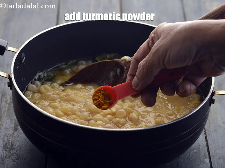 Step 16 – <p>Add the turmeric powder.</p>