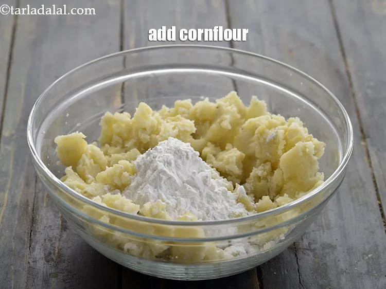 Step 25 – <p>Add the cornflour. Since the potatoes are very soft, it's hard to give them a …