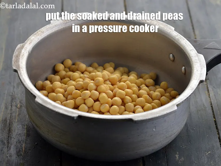 Step 7 – <p>Put the soaked and drained peas in a pressure cooker.</p>