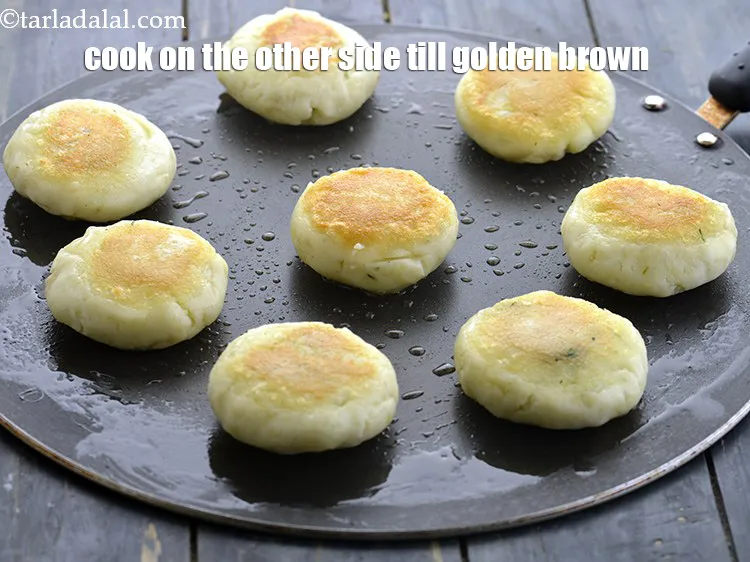 Step 44 – <p>Once the oil is hot, place all the patties on the tava and let them …