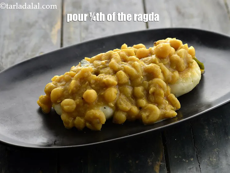 Step 47 – <p>Pour 1/4th of the ragda evenly over it.</p>