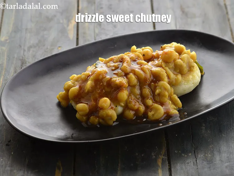 Step 48 – <p>Drizzle 1 tbsp of sweet chutney.</p>