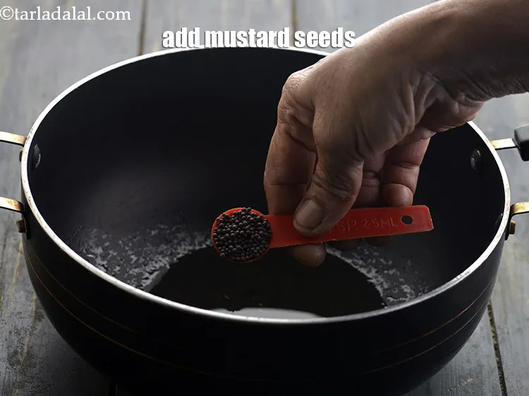 Step 11 – <p>Add the mustard seeds.</p>