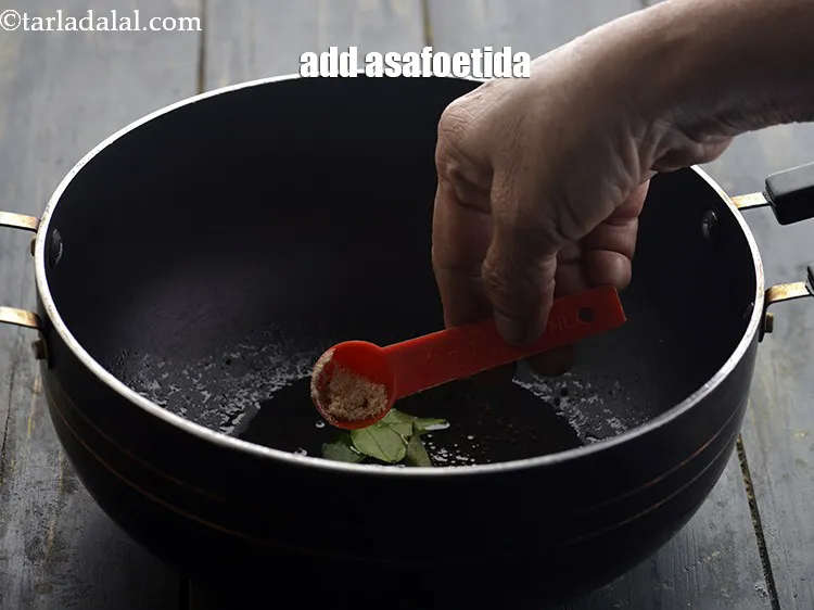Step 13 – <p>Add the asafoetida.</p>