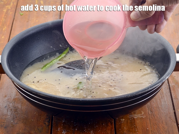 Step 13 – <p>Also add 3 cups of hot water to cook the semolina.</p>