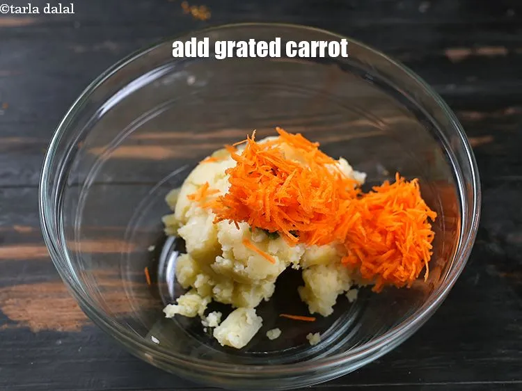 Step 29 – <p>Add 2 tbsp grated carrot.</p>